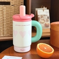 Insulated stainless steel tumbler with straw and pink heart patterns in white and green - Polka Dot Heart-Ceramic-900ML
