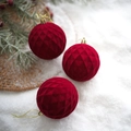 Three red velvet Christmas ball ornaments with diamond texture on snowy pine branches - Grid Pattern Flocked Ball - Red (3Pcs)