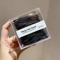 Pack of 50 black high elasticity hair ties in a clear square box for women styling - Black 50 Pcs (Boxed)