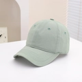 Detailed close-up of light green cotton baseball cap showing metallic eyelets and fine stitching - 54cm (3-8 Years) / Plain Style - Light Green