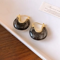 Detail of French style gold plated U-shaped earrings with black resin smoky texture inlay - Ear Buckle - Black Smoky Texture
