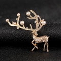 Detail of deer brooch with gold-tone antlers featuring white pearls and clear rhinestones - Pearl Rhinestone Little Deer / Gold