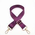 Detail of adjustable purple nylon shoulder strap with gold-tone swivel hooks and buckles - Dark Purple