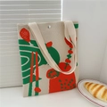 Detail of knitted floral tote bag showing woven texture and magnetic buckle closure - Chicken Leg Pattern