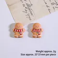 Gingerbread man resin flatback charm for DIY crafts, brown with red scarf, 25x21mm - Gingerbread Man Style 1