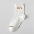 White cotton crew sock with orange good LUCK lettering and matching toe detail - Orange Letter