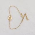 Gold finish minimalist chain bracelet featuring a hollow round pendant with letter M - Gold M