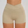Cross waist yoga shorts in light khaki with high elasticity and side pockets - Light Camel