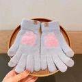 Grey knitted touch screen gloves with pink paw pattern on a wooden tray - Cat Paw / Gray