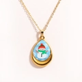 Macro detail of teardrop gold necklace with blue snowman and snowflake patterns - Blue Teardrop Snowman & Snowflake (Style 4)