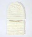 Detail of cream white knit beanie and neck warmer set showing soft ribbed texture - Beige
