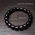 Bracelet ethnique en bois de santal vert avec perles en tonneau et grain naturel - Ébène du Mozambique 10x11mm