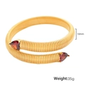 Golden snake bone elastic cuff bracelet with red triangular stones and 10mm width - Red Zirconia