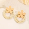 Detail of bohemian handmade wooden flower earrings with natural woven rattan ring - Beige Wood Flower Rattan Hoop Style (4981)