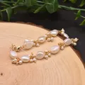 Handmade baroque pearl bracelet with irregular pearls and golden chain on wood - Baroque Irregular Pearl Bracelet