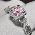 Elegant twisted band ring featuring a pink princess-cut square gemstone in a silver setting - US 5 / Pink
