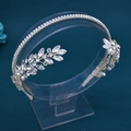 Detailed view of silver bridal headband with sparkling leaf-shaped crystal rhinestone accents - DZ056 / Silver