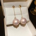Detailed macro view of long 18k gold-plated floral earrings with lavender pearls and crystals - Gold Long Pink Purple Pearl Style (39#)