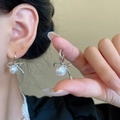 Elegant silver bow earrings with a central white pearl detail for a minimalist look - A1651 Silver-Hooks (Bow Pearl)
