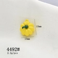 Detail view of a 13x15mm yellow pumpkin alloy pendant with green stem for DIY jewelry - 4492# Yellow Pumpkin