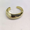 Chunky minimalist gold cuff ring with polished mirror finish and open oval design - Irregular Oval / Gold