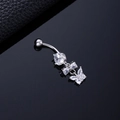 Silver butterfly belly button ring with sparkling zircon inlays on a black background - Bowtie Butterfly Silver
