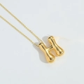 Polished gold bubble letter H pendant necklace with a sleek minimalist chain - Letter H