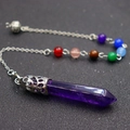 7 Chakra natural crystal amethyst hexagonal prism pendulum necklace on black background - Amethyst