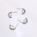 Macro shot of silver S925 C-shaped earring posts with small loop for DIY jewelry making - Silver Semi-Circle With Loop