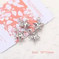 Detailed view of silver star alloy pendants with rhinestones measuring 10x13mm for DIY jewelry - Pentagram / Silver