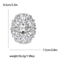 Silver large oval crystal brooch with rhinestones measuring 8.5cm by 7.2cm and 56.2g - Silver Bottom White