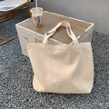 Large off-white canvas tote bag for women with durable straps for daily commute - Beige