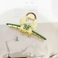 Elegant gold metal butterfly hair claw clip with green and yellow enamel details - Green