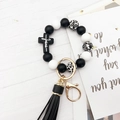 Bracciale portachiavi in perline di silicone con motivo leopardato, croce nera e nappa - Nero