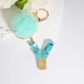 Mint green pompom keychain with blue and gold resin letter Y pendant for women handbags - Letter Y