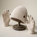 Detail of beige ribbed knit hat and touchscreen gloves with premium leather shield labels - One Size / Beige