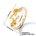 Goldener Blatt-Ring offen mit gelben Kristallen und detaillierten Größenangaben - Goldton mit gelbem Zirkonia