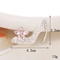 Detailed macro view showing the rhinestone-encrusted high heel brooch with pink flower - Silver Base Pink Flower Rhinestone