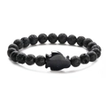 Close-up of black lava stone beads and sparkling blue sandstone fish charm bracelet - Blue Sandstone Lava Stone Penguin