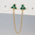 Macro detail of gold-plated flower stud earrings with green zircon and tassel chain link - Gold Green Rhinestone