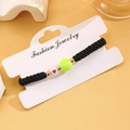 Bracciale regolabile in corda nera intrecciata con ciondolo pallina da tennis e cuore - 04 KC Oro Stile Tennis