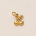 Detailed close-up of 18K gold-plated stainless steel cherry fruit pendant accessory - Metal Cherry