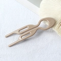 Detail of a brown U-shaped hair pin for buns with a smooth glossy resin finish - 9cm Fishtail Double Prong (Khaki) / 9cm U-Shaped Hair Fork / Khaki