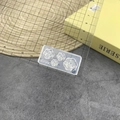Macro shot showing dimensions of a 3D rose nail art silicone mold with ruler - #180 Camellia