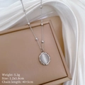 Dettaglio della collana in opale di acciaio al titanio con misure della catena 40+5cm - Argento