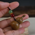 Handcrafted rosewood gourd keychain pendant with colorful decorative beads in hand - Keychain style / Small (2.1x2.1x4cm) / Green Sandalwood