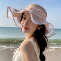 Women's beige straw sun hat with pink floral ribbon and white pearl accents for beach - Wave Floral Pink