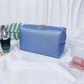 Blue textured bridal makeup bag with gold zippers on white silk background - Medium / Holographic Blue