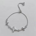 Silver adjustable bracelet with mother of pearl star charms and sparkling cubic zirconia - Cross Star Style / Silver (B770)