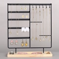 Multi-tier black iron jewelry organizer with wooden base for earrings and watches - Black
